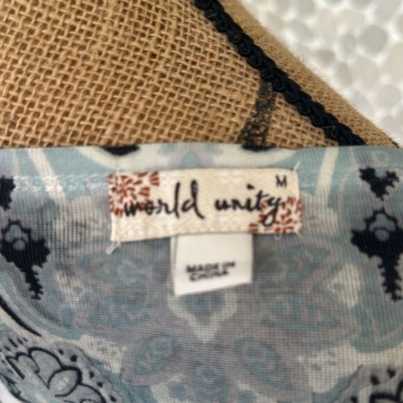 NWT World Unity printed blue short sleeve top – size M - Picture 7 of 8